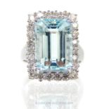 A Aquamarine and Diamond Ring.