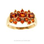 A Gold Fire Opal Dress Ring.