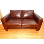 A Brown Leather sofa.