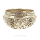 An Indian or Burmese silver coloured metal bowl.