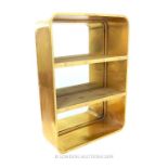 A Contemporary Gilt Metal Mirrored Hanging Shelf.