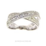 An 18 carat White Gold Diamond crossover ring.