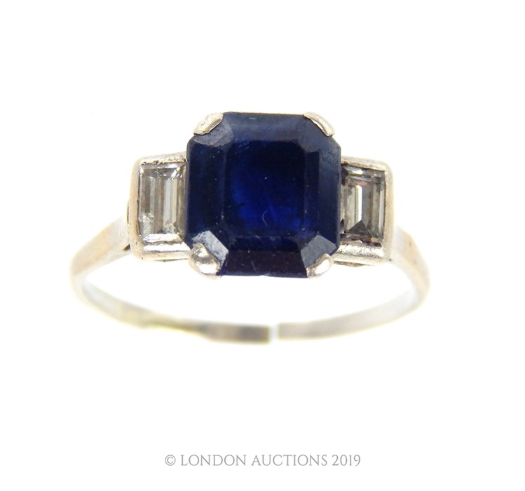A Sapphire and Diamond Ring.