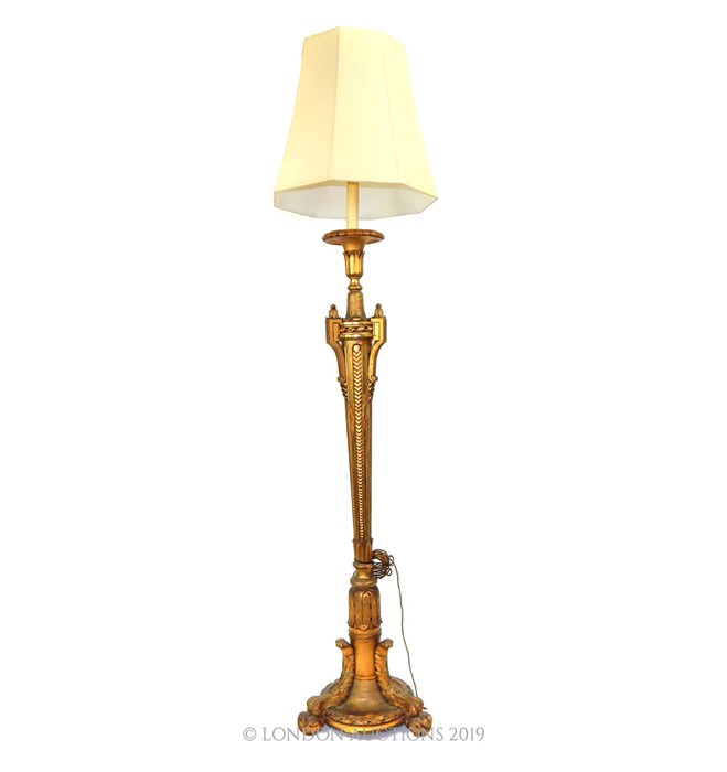 An Italian Gilt Wood Standard Lamp.