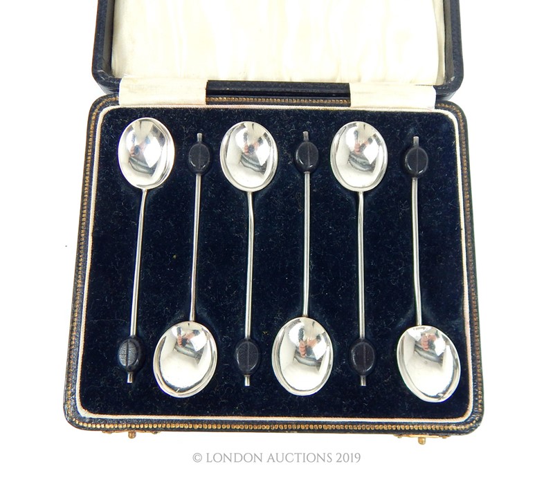 A Set of Six Late Victorian Sterling Silver Coffee Spoons.