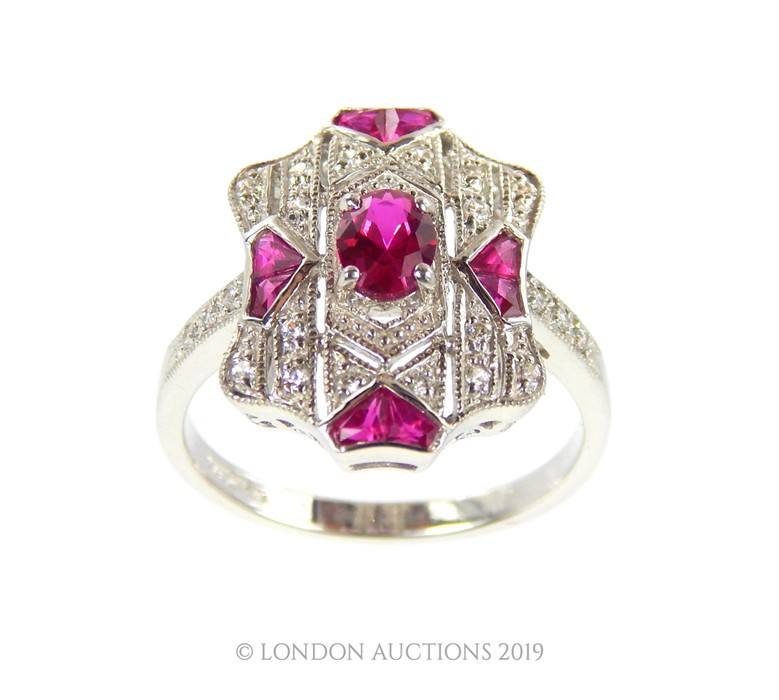 A Cubic Zirconia And Ruby Art Deco Style Ring.