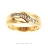 A 14 Carat Gold Sixteen Baguette Cut Diamond Ring.