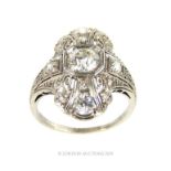 An 18 Carat White Gold Art Deco Diamond Ring.