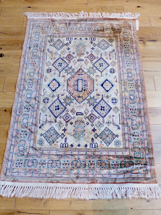 A Small Part Silk Persian Rug.