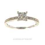 A Vintage 10 Carat White Gold Princess and Single Cut Diamond Ring.