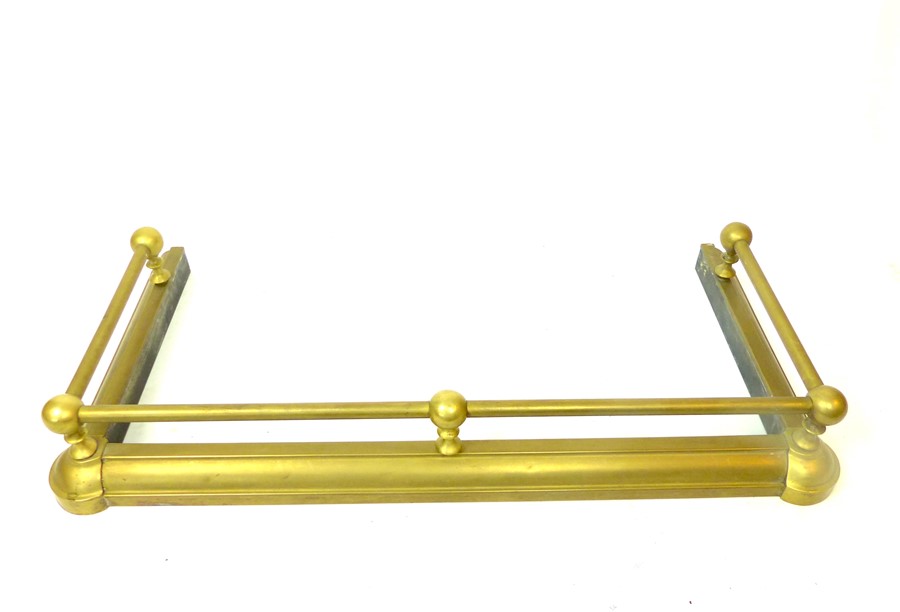 A Brass Fire Place Fender.