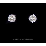 A pair of 14 Carat White Gold Diamond Stud Earrings of 1.4 Carats.