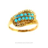 A Vintage 18 Carat Gold Turquoise Fern Style Dress Ring.