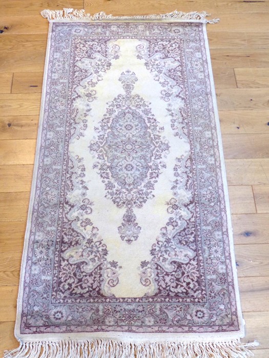 A Small Persian rug