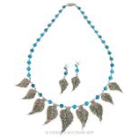 An Impressive Silver and Turquoise Necklace with Matching Earrings.