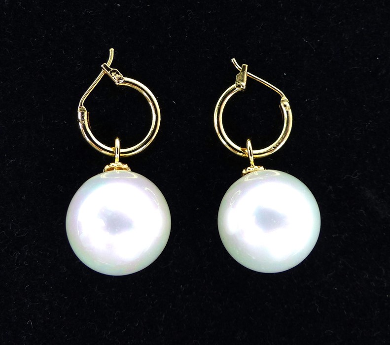 A Natural Australian White Pearl Shell Drop Earrings.