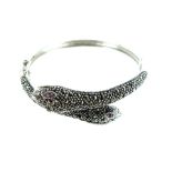 A Silver and Marcasite Snake Bangle.