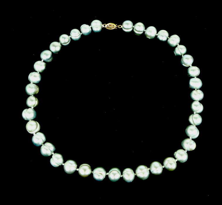 A Vintage 10-12 mm AAA South Sea Grey baroque pearl necklace.