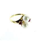 A 10 Carat Gold Akaya Pearl and Ruby Ring.