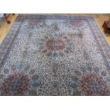 A Large Persian Style Carpet