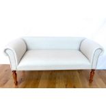 A Small Uhpolstered Two Seater Window Sofa.