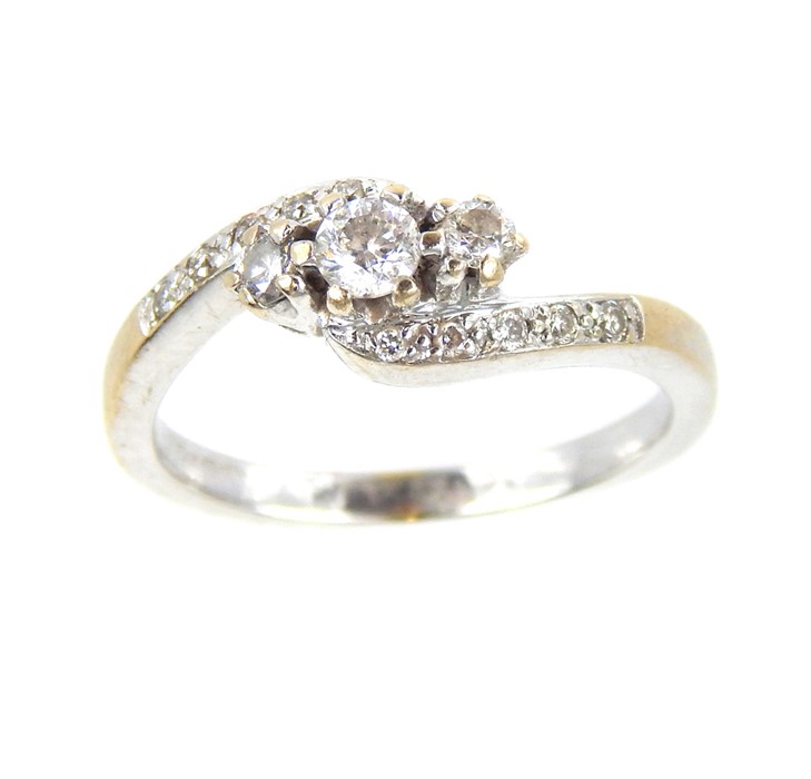 A Vintage 18 carat White Gold Three Stone Ring.