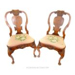 A Pair of George II Chairs.