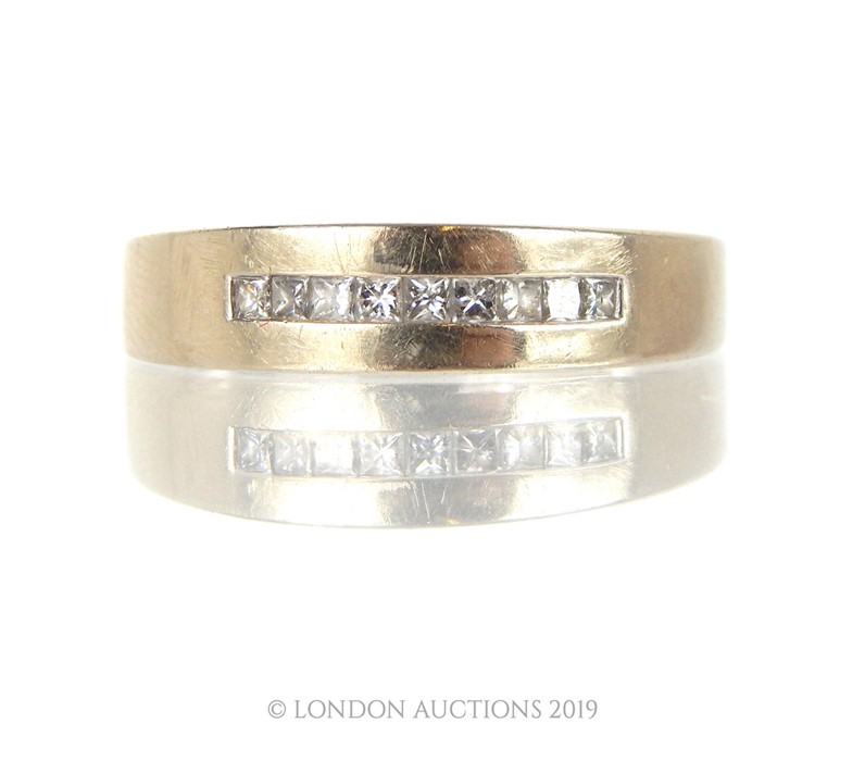 A 14 carat White Gold Nine Princess Cut Diamond Band Ring. - Image 2 of 4