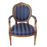 A French Spoonback Open Armchair.