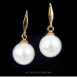 An Akoya AAA++ Pearl Drop Earrings.