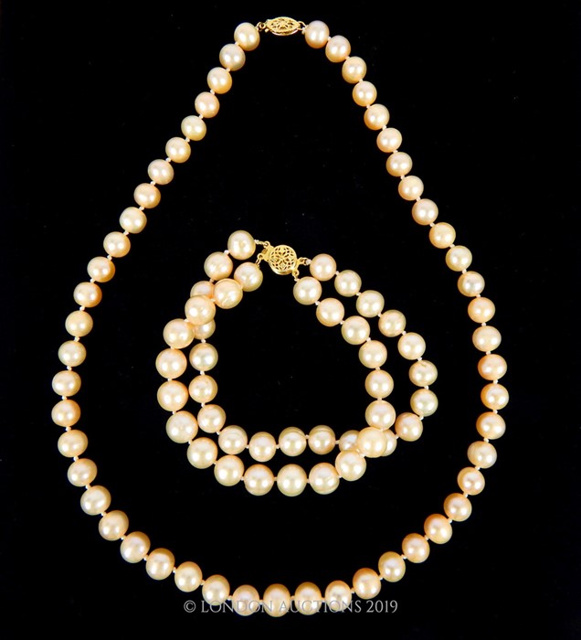 A South sea Pink Pearl Necklace and Bracelet Set.