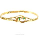 A 14 Carat Gold Diamond and Emerald Bracelet Set.