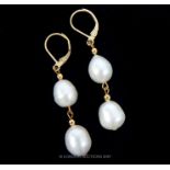 A South Sea AAA+ Drop Pearl Earrings.