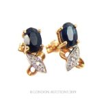 A 9 Carat Gold Sapphire and Diamond Stud Earrings.