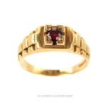 A Mens 9 Carat Gold Garnet Solitare Ring.