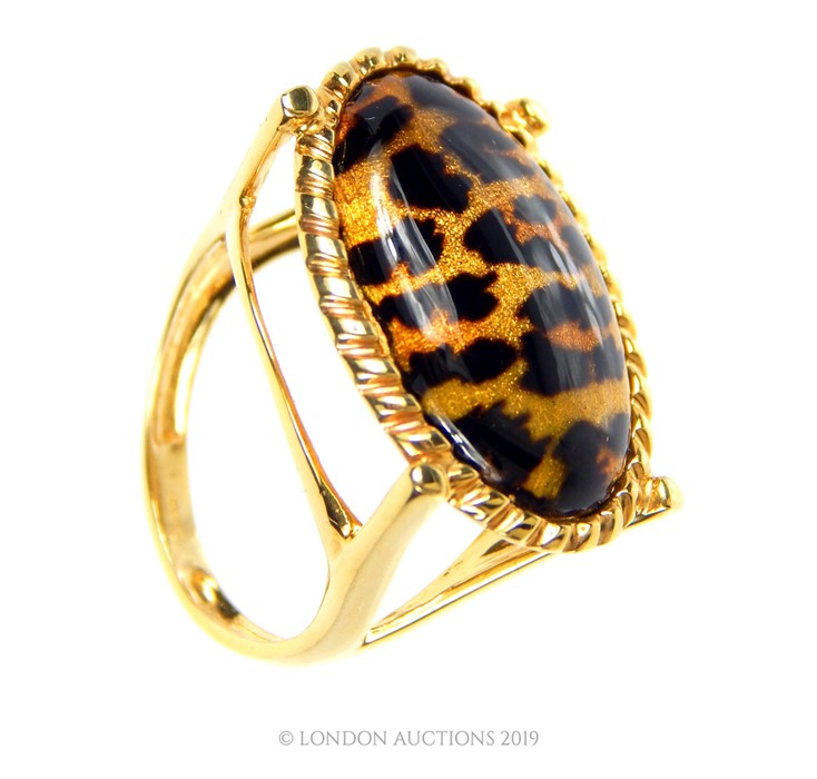 A 9 Carat Enamel Leopard Design Ring.