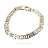 A Vintage 9 Carat White gold bracelet four links with nine clusters of diamonds