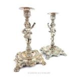 A Pair of Candle Sticks. Unmarked Silver Plate