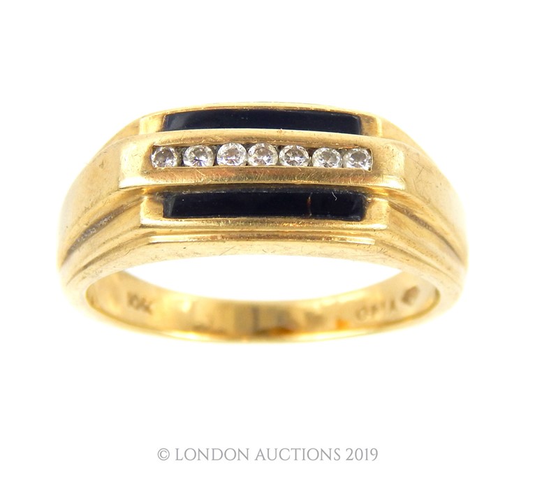 A Mens 10 Carat Gold Ring.