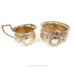 A Small Jug And Bowl With A Floral Relief Decoration,Hallmarked London 1896 And 1895