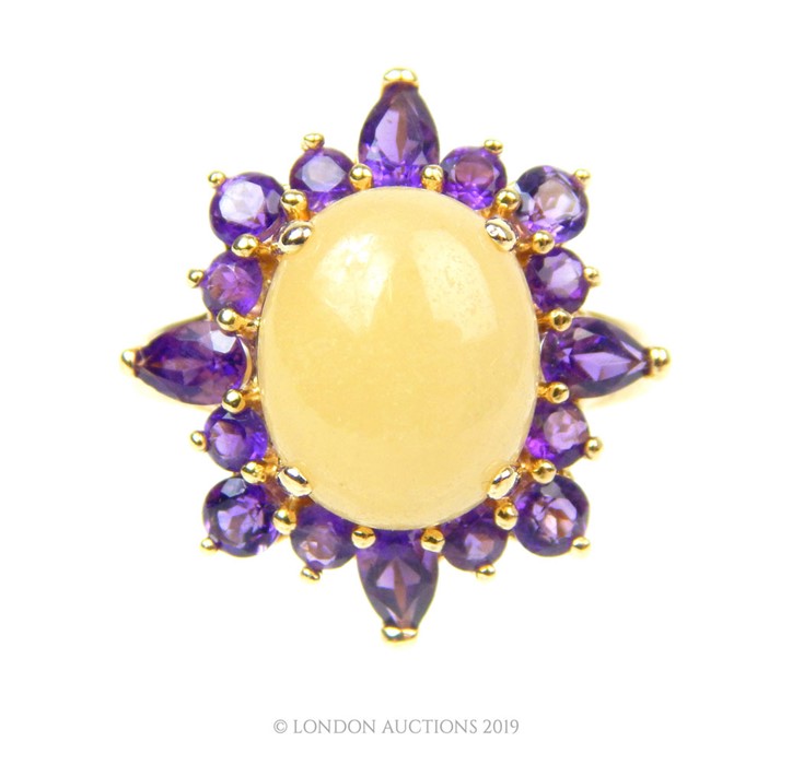 A 14 Carat Gold Oval Claw Cabochon White Jade with Halo of Amethyst Ring. - Image 2 of 4