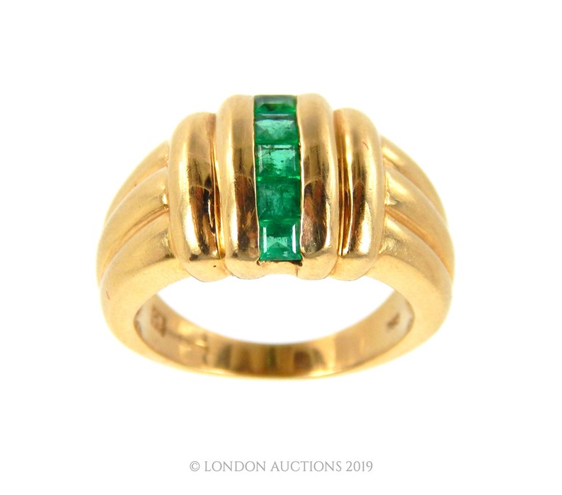 A 14 Carat Gold Art Deco Design Emerald Ring.