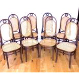 A Set of Eight Mid 20th Century Rattan Chairs.