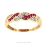 A Vintage 14 Carat Gold Diamond and Ruby Ring.