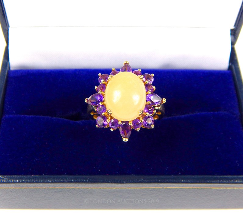 A 14 Carat Gold Oval Claw Cabochon White Jade with Halo of Amethyst Ring. - Image 4 of 4