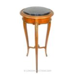 A Marble Top Pedestal.