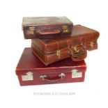 Three Attache Cases.