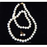 An Akoya White Pearl Necklace and Matching Stud Earrings.