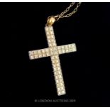 A Vintage 9 Carat Gold Diamond Cross pendant and Chain.