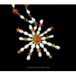 A Vintage 9 Carat Gold Amber and Fresh Water Pearl Starburst Necklace.